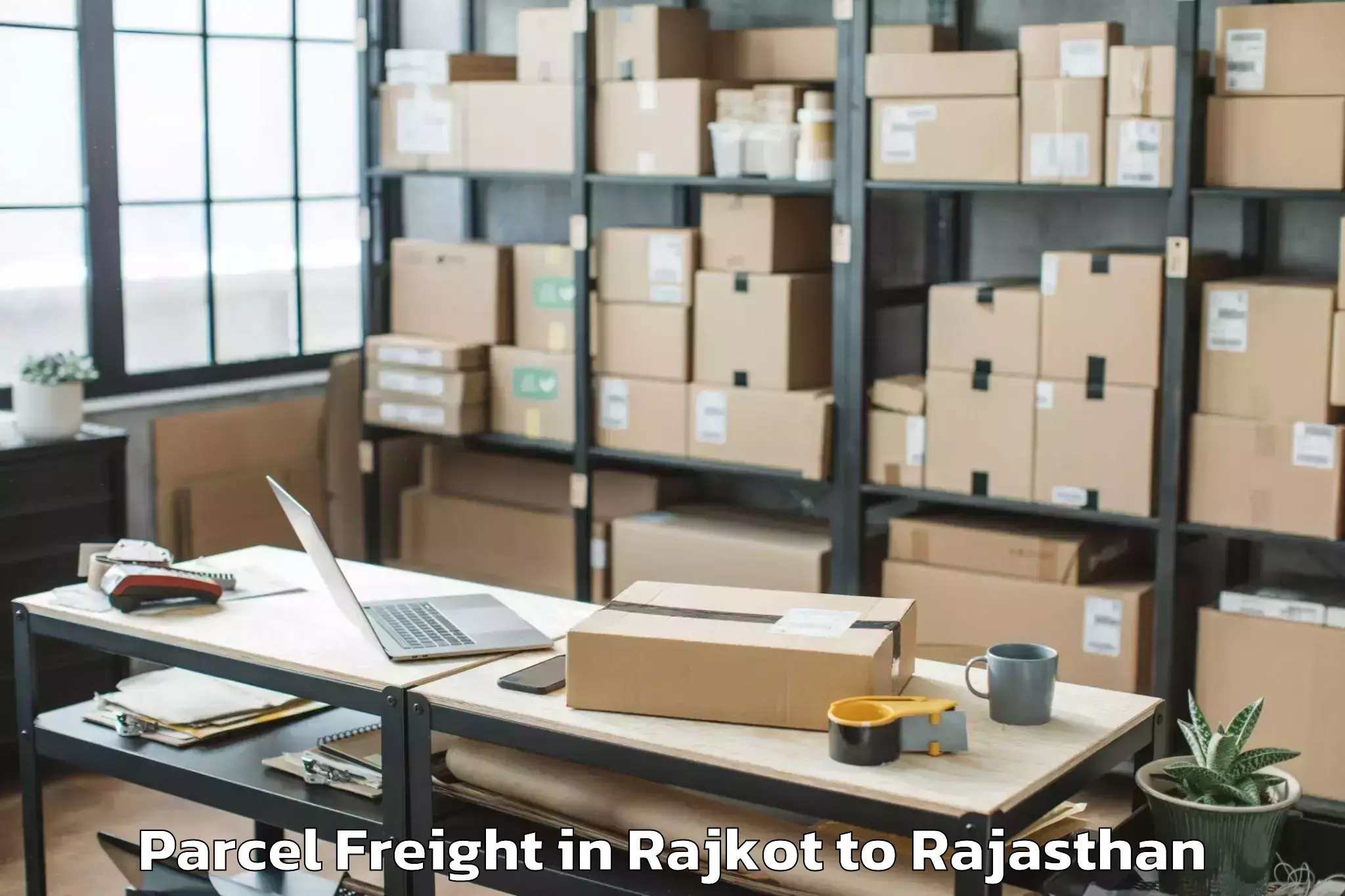 Quality Rajkot to Rajasthan University Of Health Parcel Freight